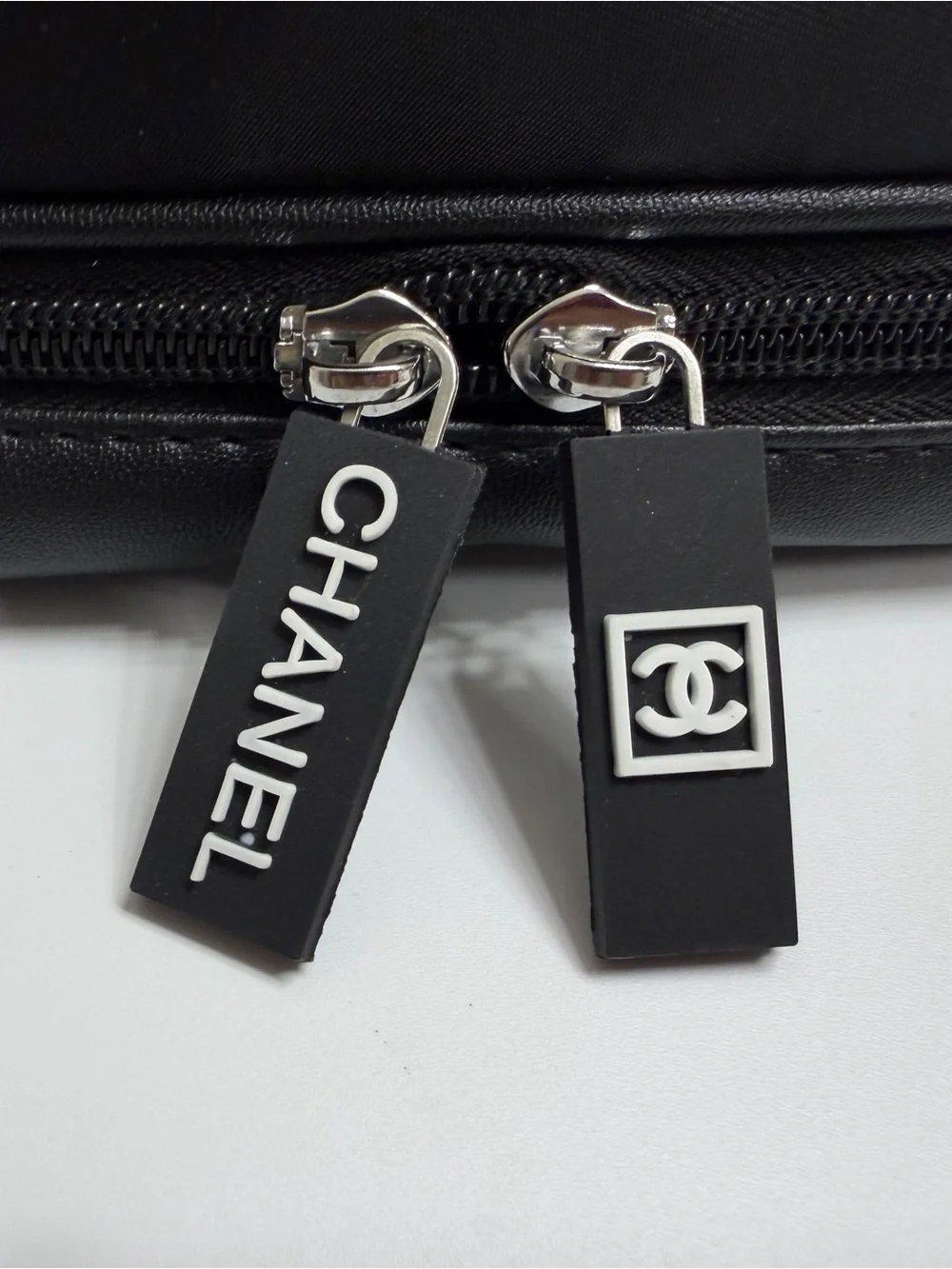 CHANEL Beauty- Black Cosmetic Pouch with White CC and Logo Tag